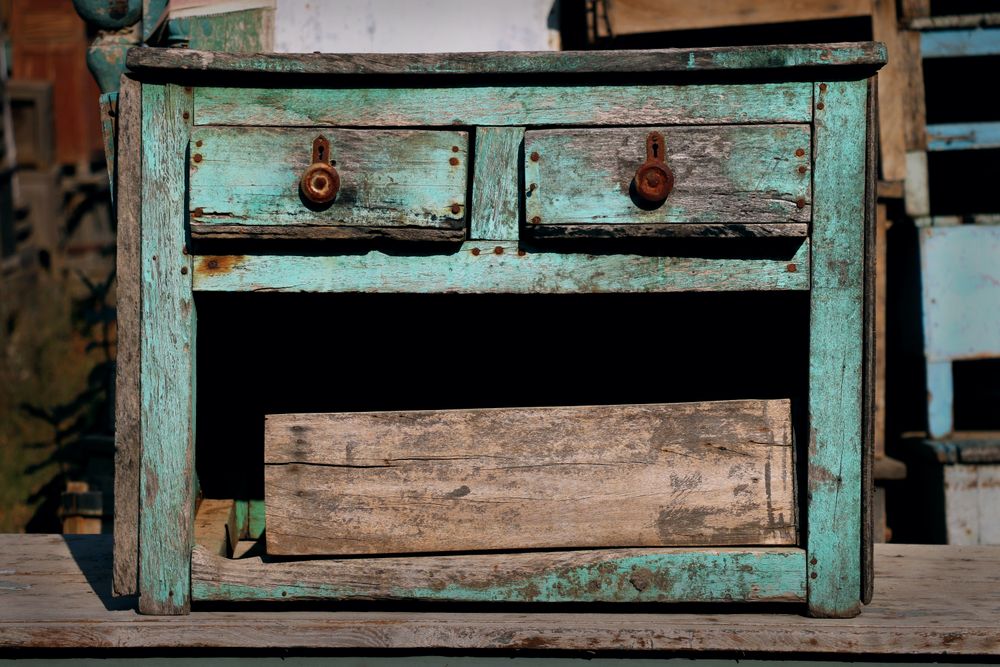 Hand-cut dovetail joint on an antique drawer — a telltale sign of real age