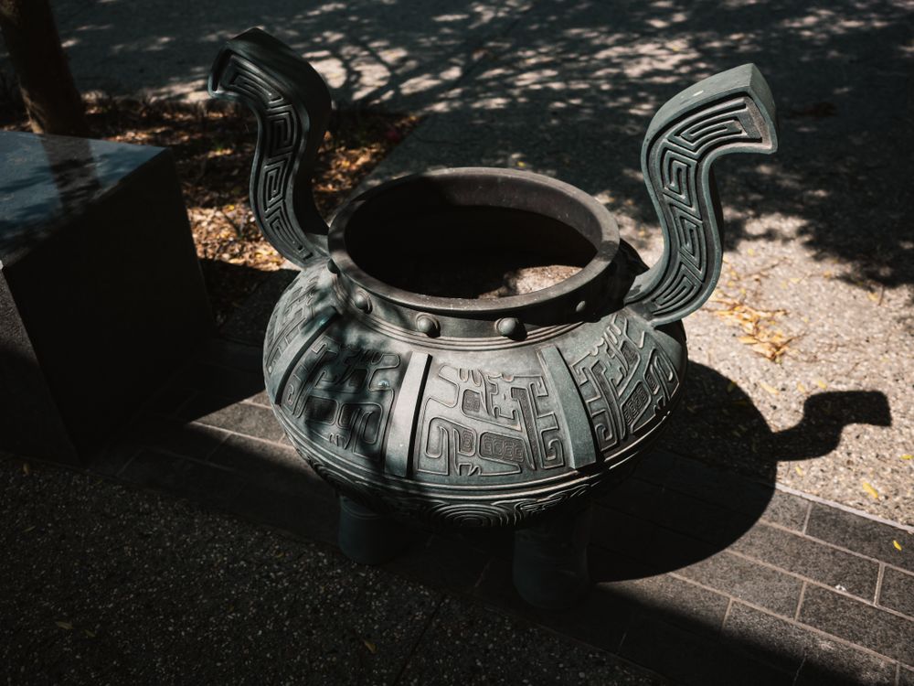 Antique Chinese bronze vessel with an aged patina