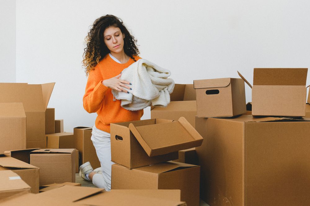 Antiques carefully packed for removal after a whole-house buyout